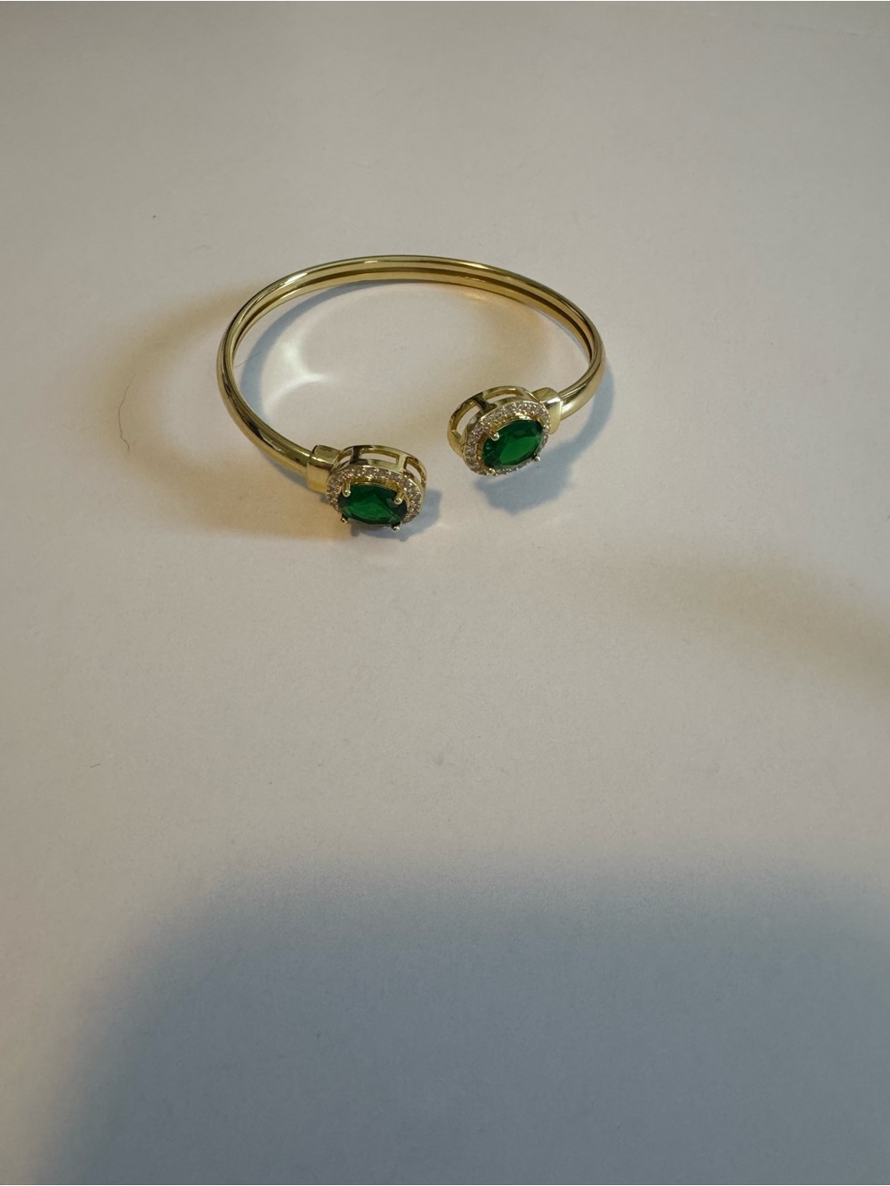 Gold-Tone Open Cuff Bracelet with Green Gemstone Accents